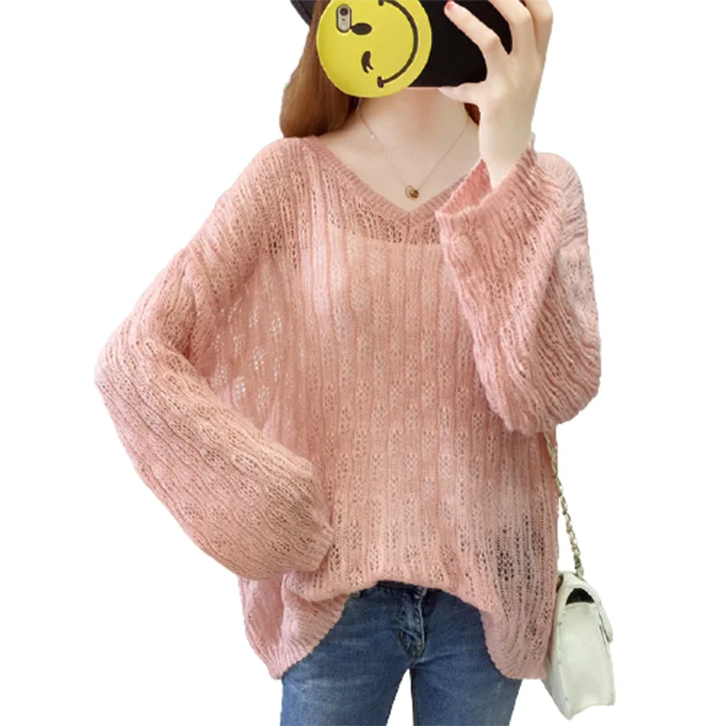 

Женский свободный пуловер с V-образным вырезом и вырезами