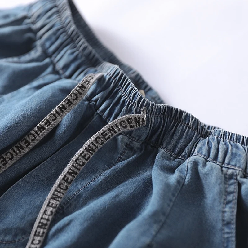 

SOUL OF TIGER New 2021 European Style Ladies Denim Casual Trousers Women Elastic Loose Jeans Female Vintage Harem Pants Big Size