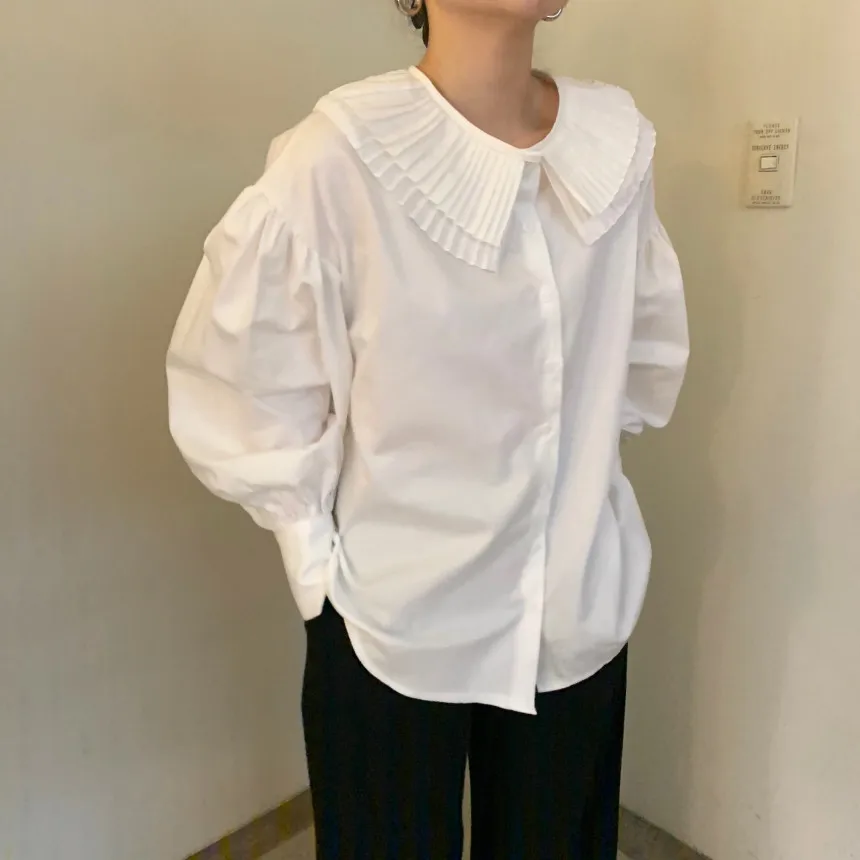 

Элегантная белая женская рубашка в Корейском стиле, новинка 2021, весенние шикарные женские блузки, свободные топы с длинными рукавами и отло...