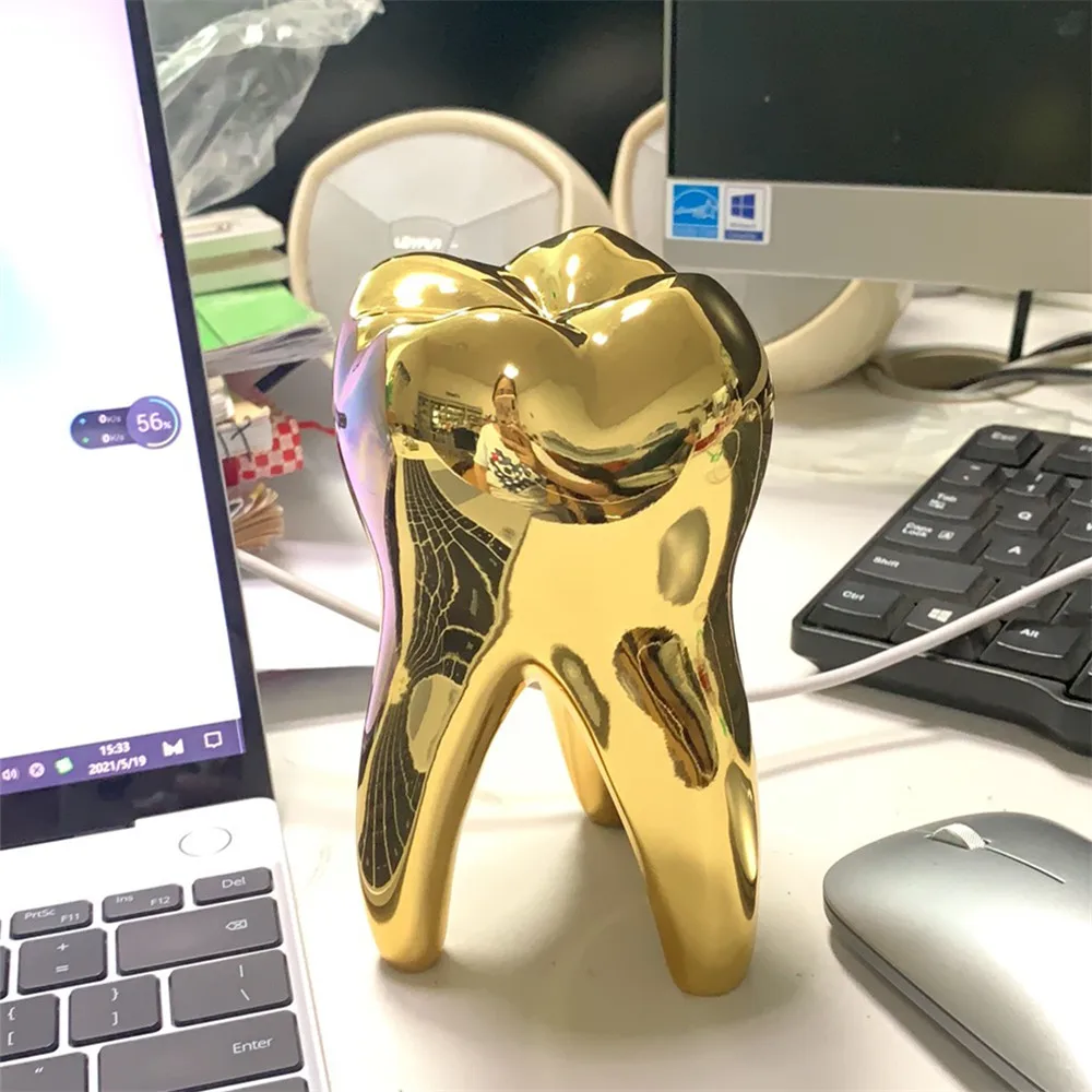 Маленькая модель золотистых зубьев искусство стоматология подарки клиника