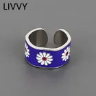 Кольцо женское, серебристого цвета, с голубыми цветами