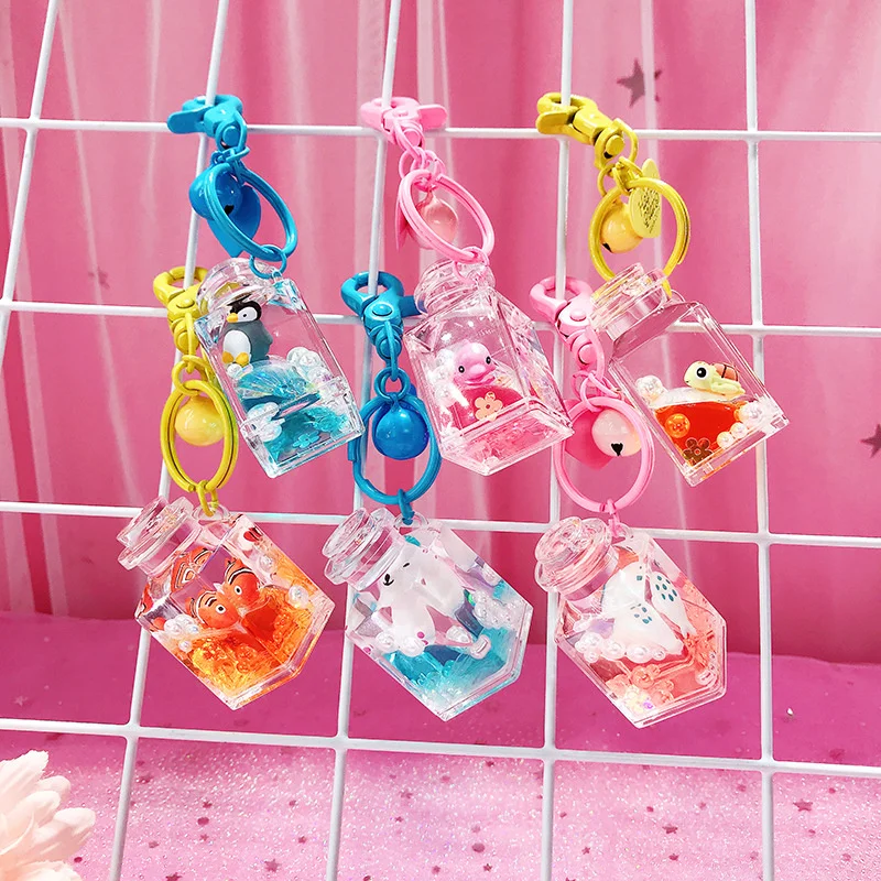 

New fashion cute girl heart floating ocean doll keychain creative water world animal quicksand key chain bag pendant wholesale