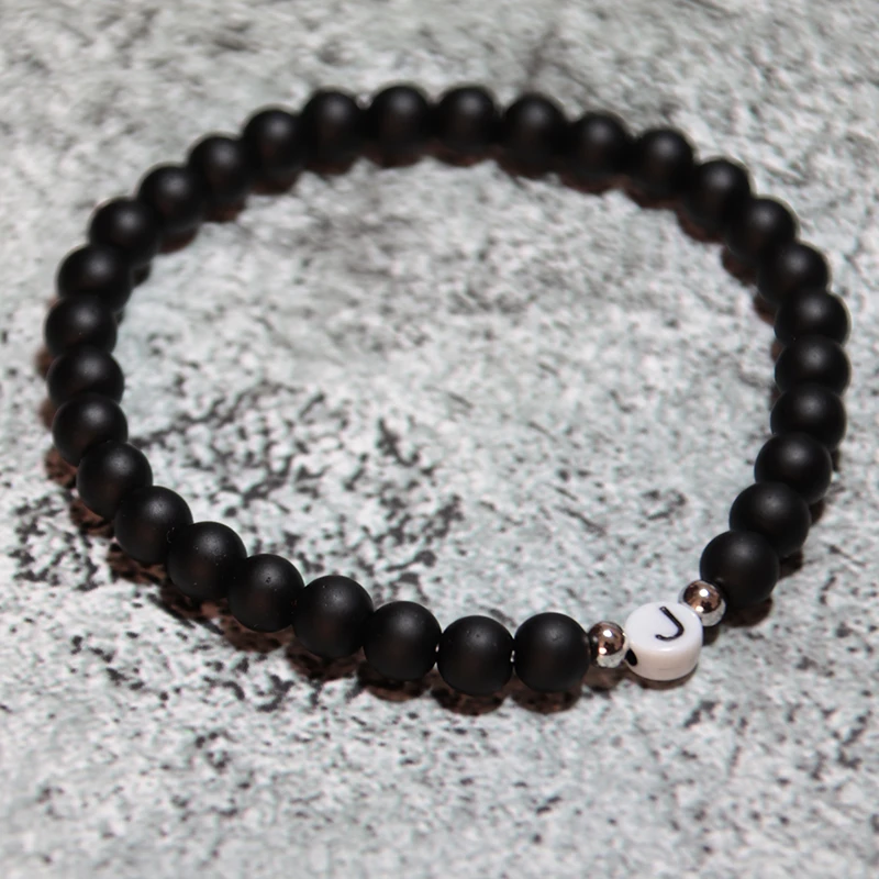 Мужские и женские браслеты Noter черные белые из натурального камня с надписью