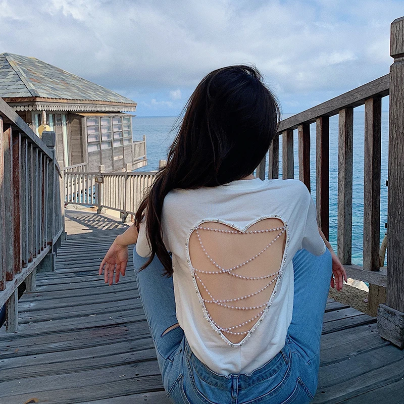 

2021 Women New Fashion Summer Sexy Pearl Chain Heart Back Hollow Out T-shirt Korean O-neck Loose Club White Tshirt Temperament