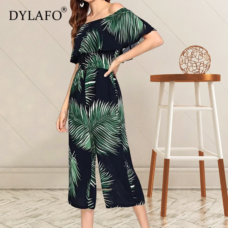 Женский комбинезон с воланом зеленый открытыми плечами элегантные вечерние