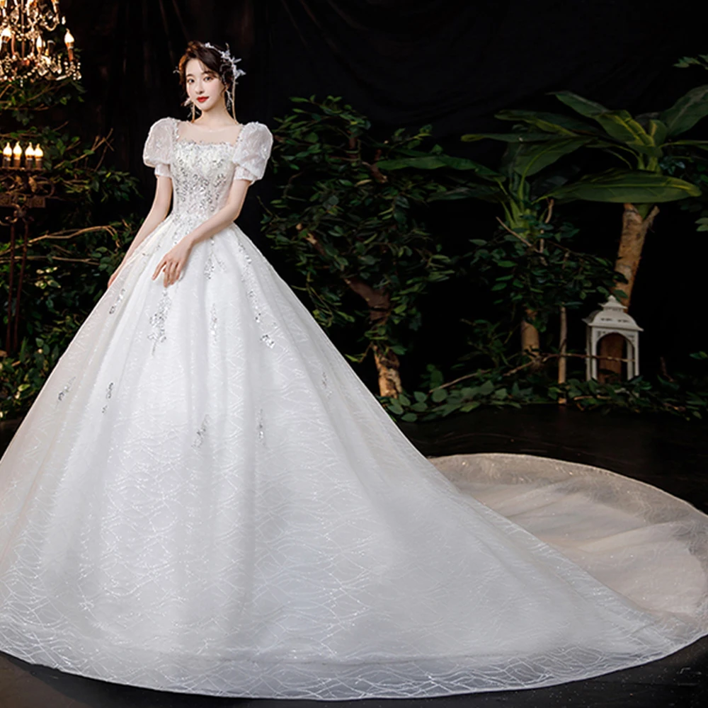 

Dioflyusa French Luxury Lace Princess Bride Wedding Dress 2021 Sliver White Boat Neck Elegant Simple Formal Tulle Ball Gown