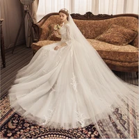 elegant wedding dress o neck long sleeves tulle applique sweep button backless a line bridal ball gown