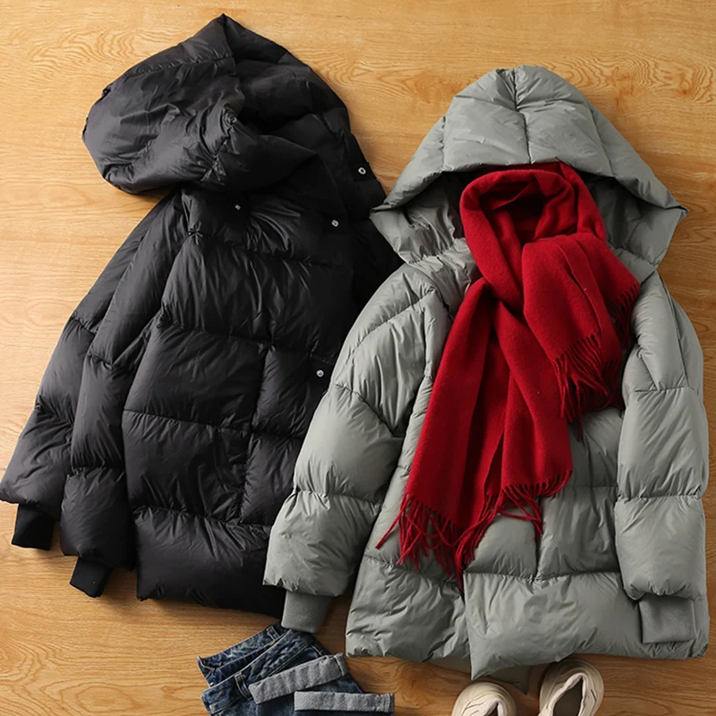 Женский пуховик с капюшоном на белом утином пуху рукавом летучая мышь пушистый