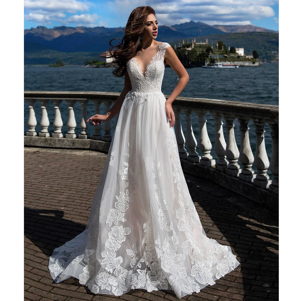 

Elegant A Line Beach Wedding Dress 2021 Boho Appliques V Neck Vintage Bridal Gowns Buy China Direct Vestige De Noiva