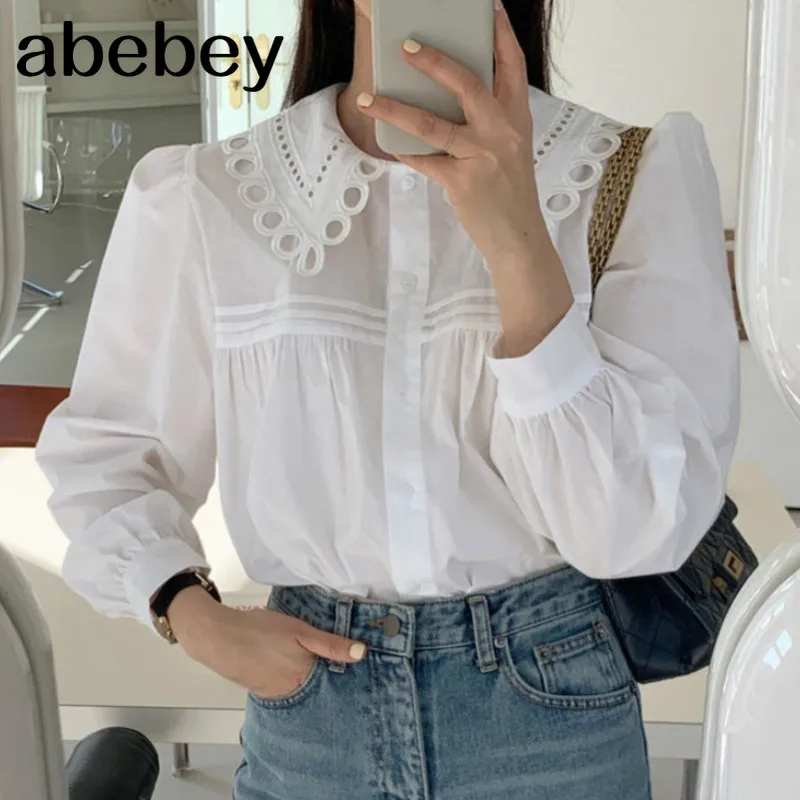 Пикантная однотонная блузка с вырезами женская кукольным воротником и длинным