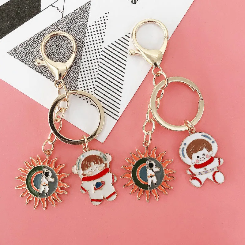 

2021 Creative Alloy Cartoon Astronaut Keychain Fashion Cartoon Spaceship Fu Bag KeyChains Popular Lovely Bag Fresh Gift