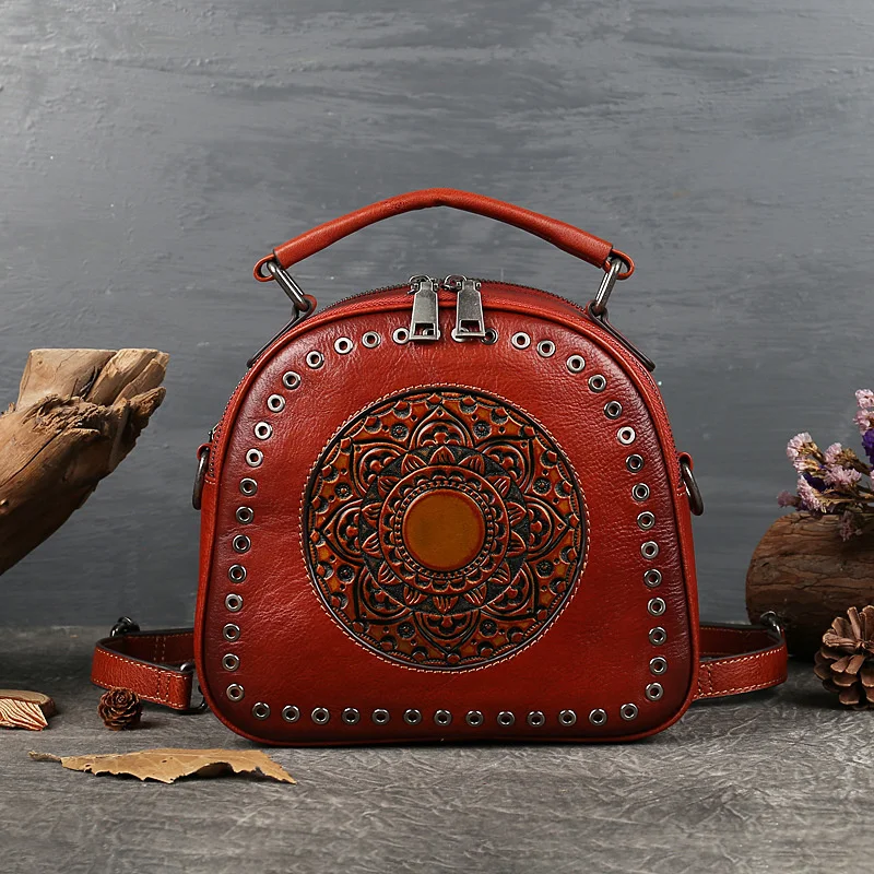 Women's bag 2021 new leather women's head round hole totem portable single shoulder |