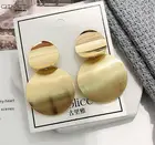 Серьги-подвески женские круглые золотистыечерные, с металлическими вставками