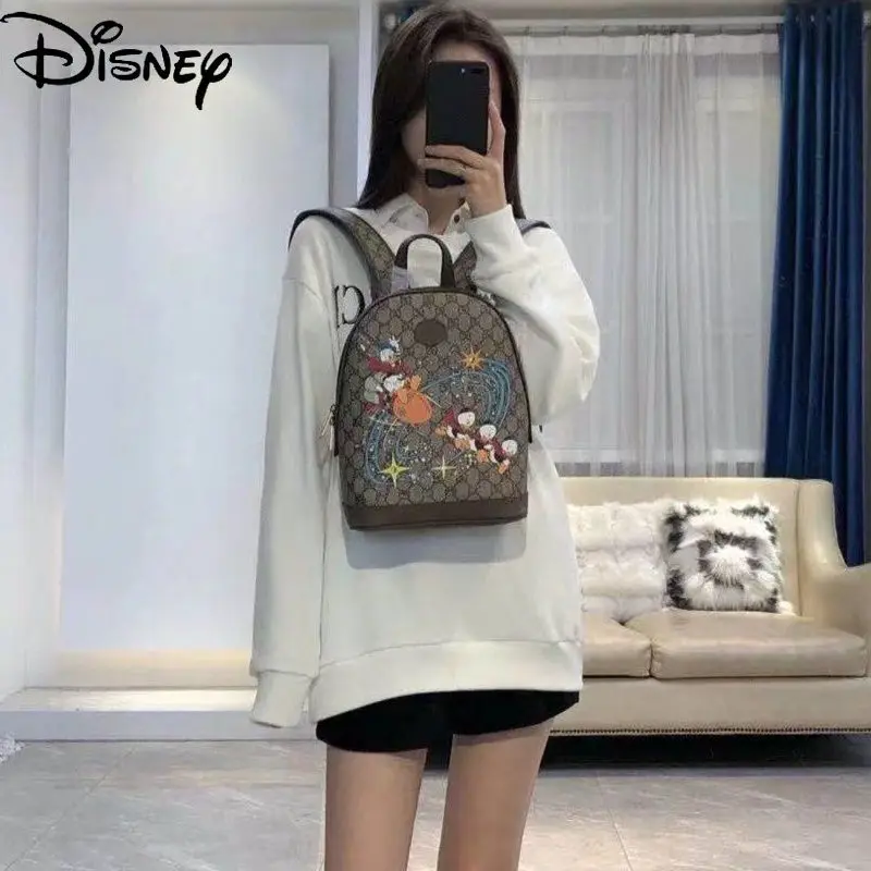 

Disney Fashion Cartoon Cute Lady Donald Duck Print Leather Zipper Backpack Unisex Shoulder Bag Casual Large-capacity Travel Bag