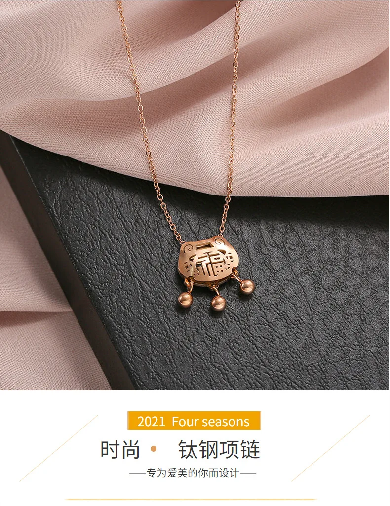 

Long life lock titanium steel necklace female tassel bell hollow blessing clavicle chain simple wild national trend jewelry