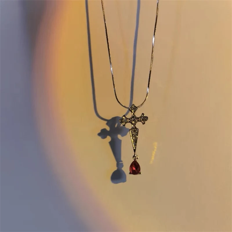 

The New creative personality cross pendant necklace for ladies Vintage punk red gemstone women's necklace gift Jewelry wholesale