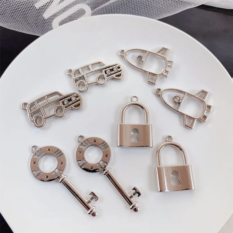 

50pcs/lot cartoon Lock key car rocket shape alloy floating locket pendant charms diy jewelry earring/necklace accessory