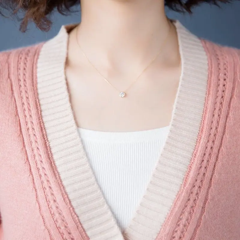 

2020 Autumn new women's knitted cardigan coat Korean version of the short stitched women's knitted sweater
