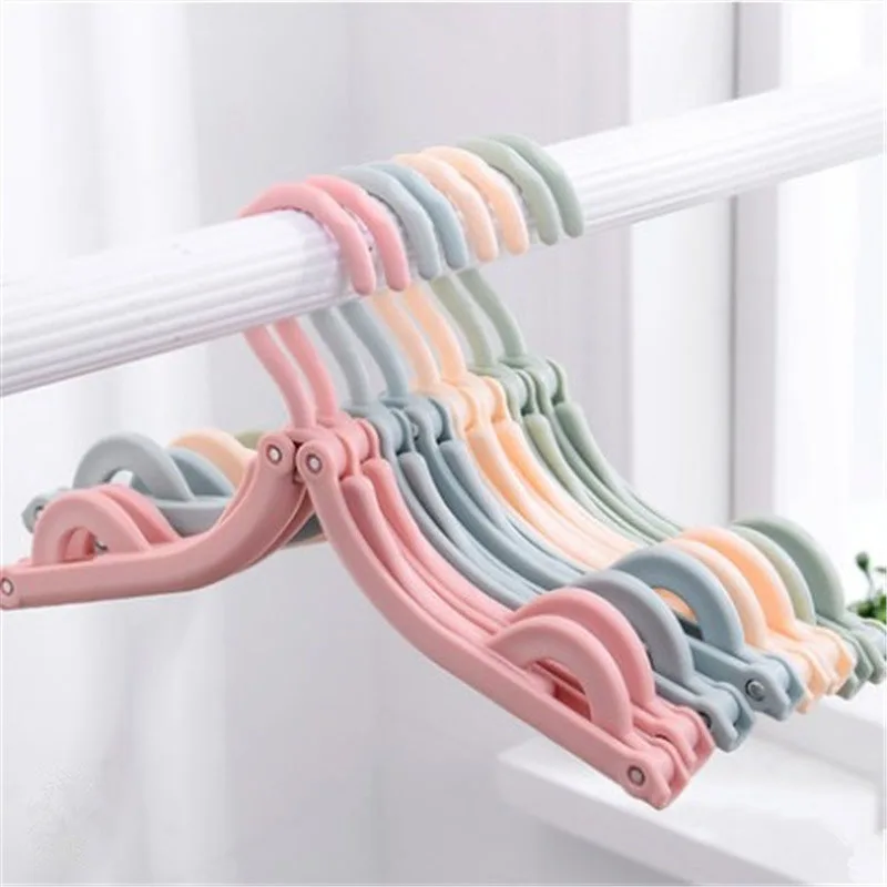 

4 PCS/Set Plastic Coat Hanger Home and Travel Use Foldable Multi-functional hangers for clothes Out door Plastic Drying Rack