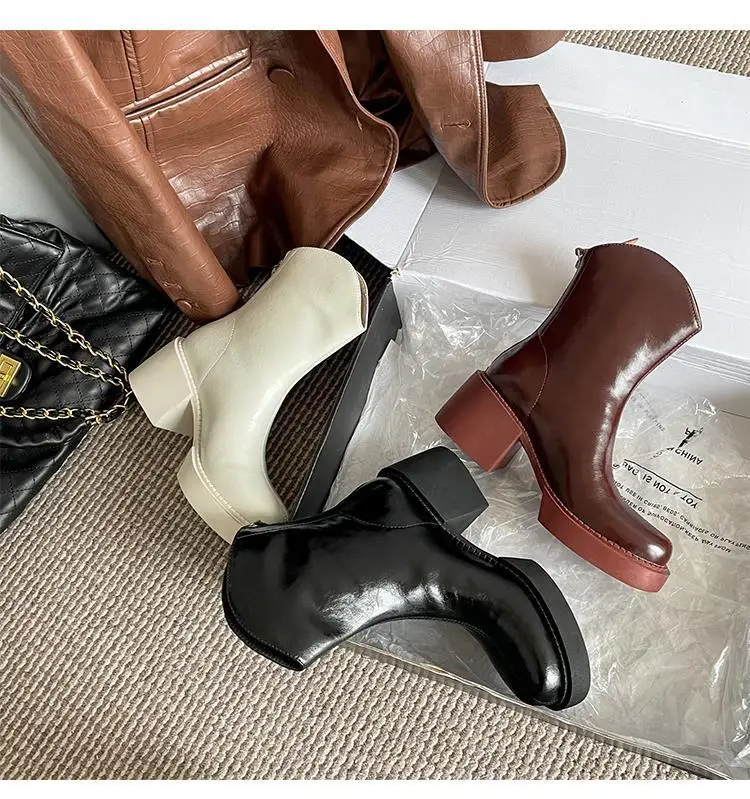 

Женские ботинки из натуральной кожи, на высоком массивном каблуке 6 см