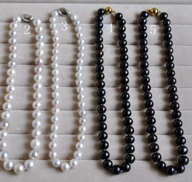 

Жемчужное ожерелье-чокер, черное/белое, с золотой застежкой, 43/17/35 см