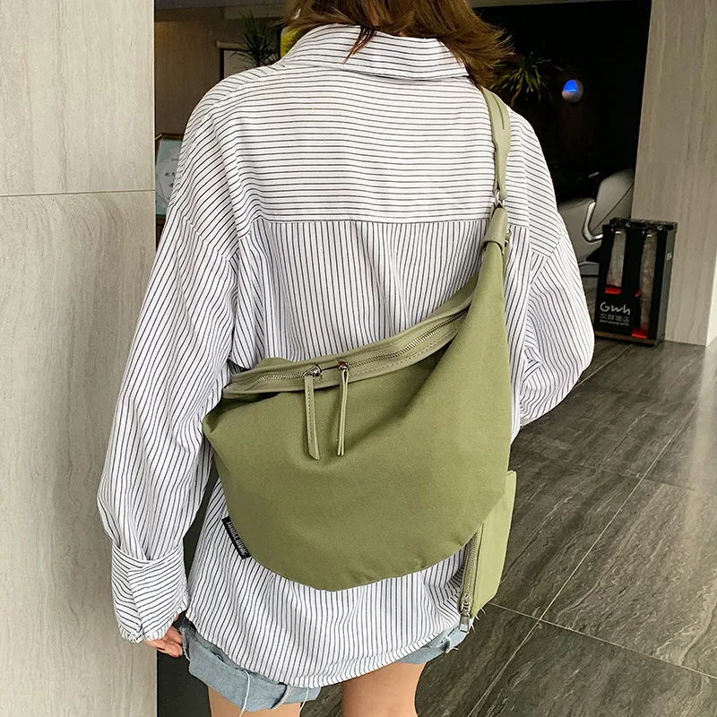 

New female large capacity 2020 bag Korean version of foreign canvas shoulder bag fashion casual slung chest bag jiaozi bag