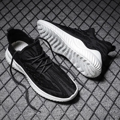

2021 new men's shoes spring Korean fashion sports leisure mesh flying canvas versatile shoes