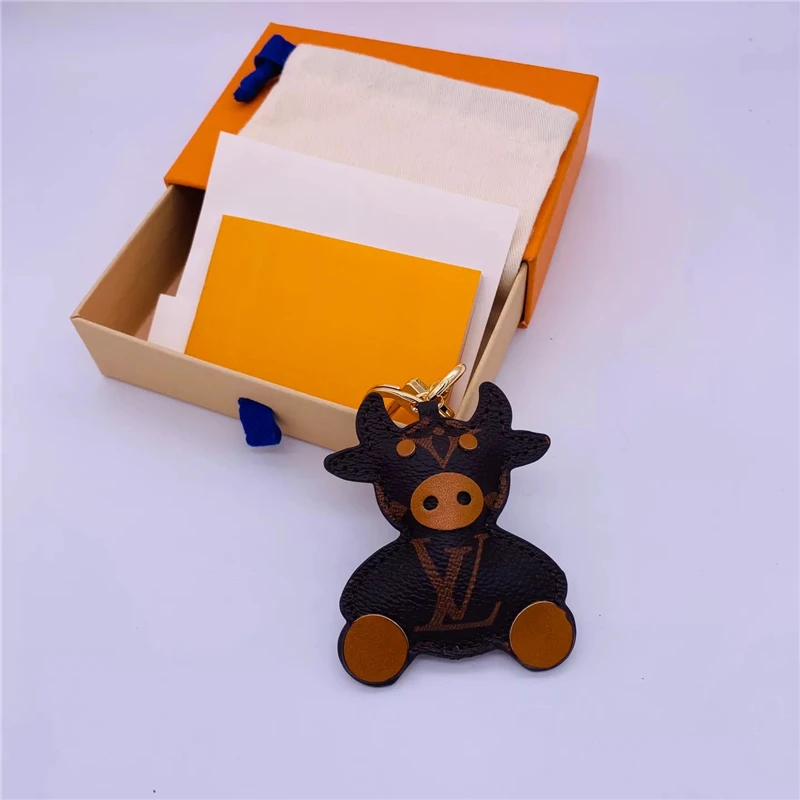

2021 New High Quality Funny Cattle Keychain Acrylic Colourful Christmas Gift Keychains for Car Keys Ring Decoration Accessories