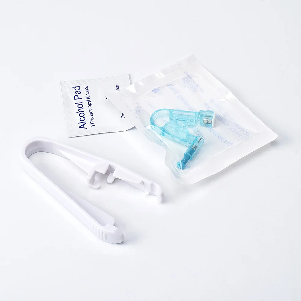 

Disposable Tattoo Ear Piercing Painless Sterile Puncture Machine Earrings Studs Body Jewelry Gun Set