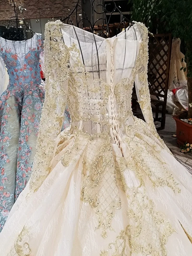 Свадебное платье цвета шампанского и золотого с длинным рукавом настоящие