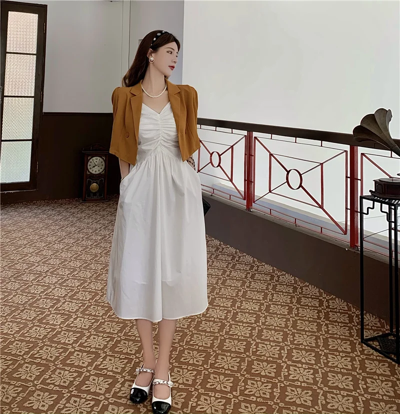 

White Suspender Dress Summer French V-neck Pleated First Love Fairy Skirt 2021 New Medium Length Skirt