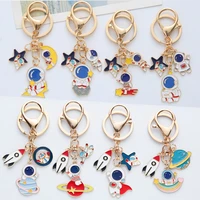 new astronaut keychain charms creative cartoon spaceman metal key chain for children space fans souvenirs pendant gift wholesale