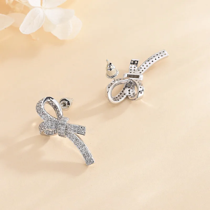 

2019 European and American luxury jewelry designer new sweet woman temperament earrings simple bow earrings S925 silver needle w