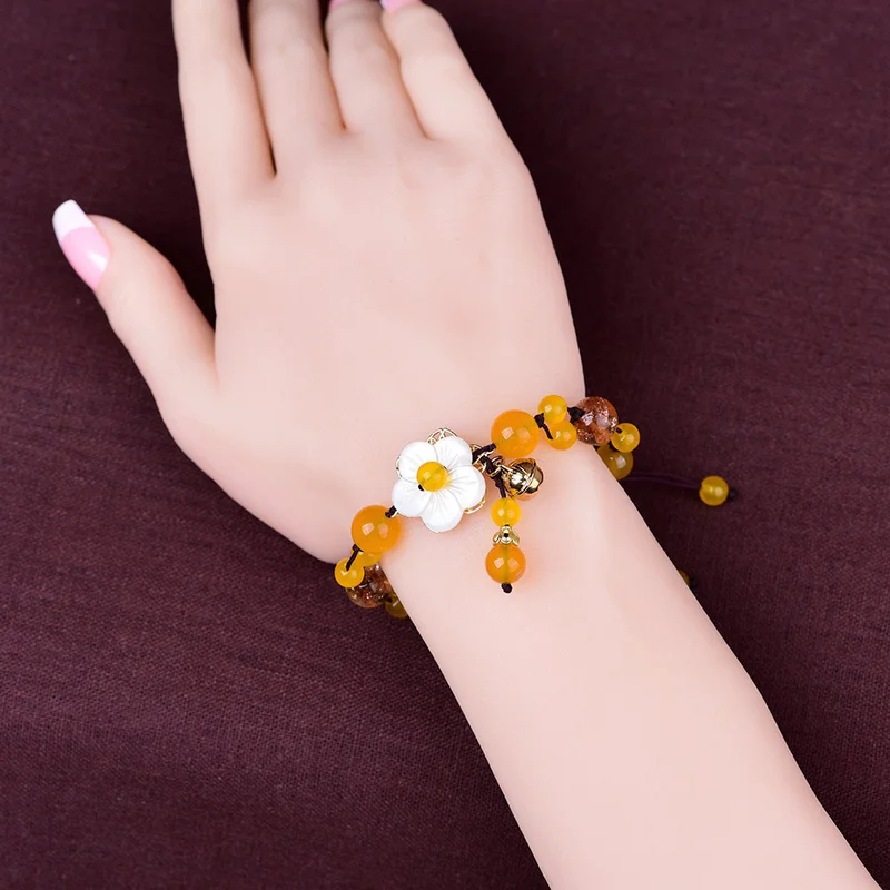 Женский браслет с подвесками в богемном стиле желтый ракушками цветами и камнями