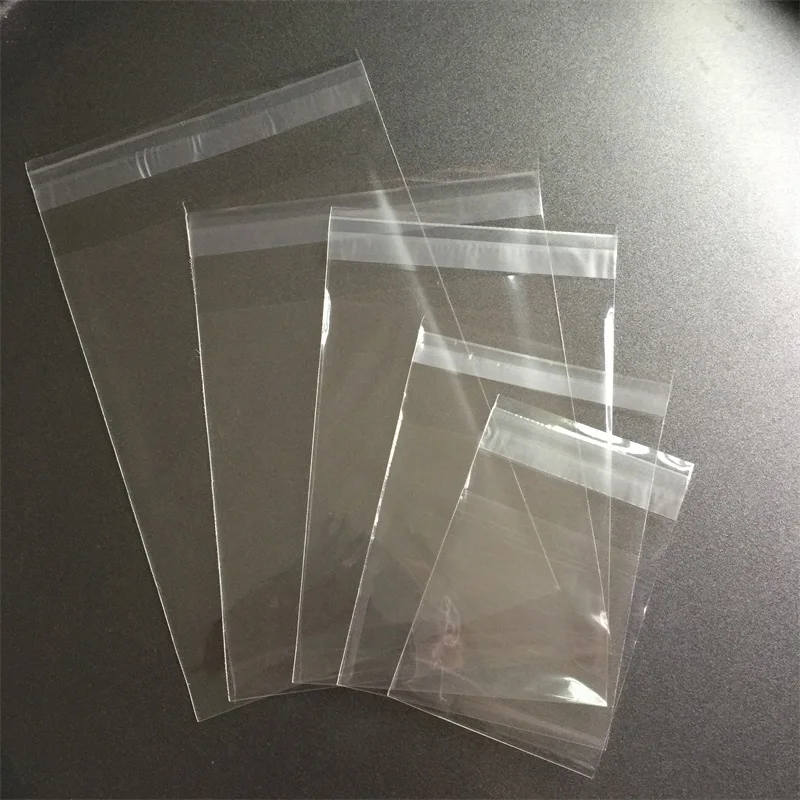 

100pcs/lot 5 Size Transparent Cookie Packaging Bags Self-adhesive Plastic Biscuit Bag Wedding Candy Bags