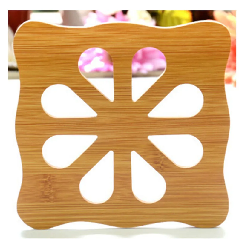 

Kitchen bamboo hollow wooden coaster thick anti-scalding cartoon insulation pad table mat non-slip pot mat bowl mat