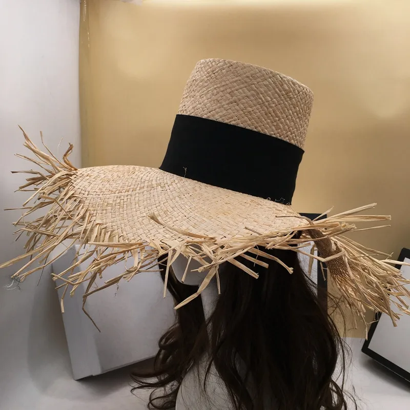 The new sun hat burrs thin section lafite grass is prevented bask in large straw hat brim gao tou2 flat hat for a holiday