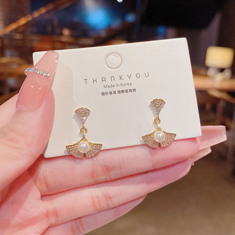 Прямая поставка посеребренные рекламные серьги с юбкой женские для девушек