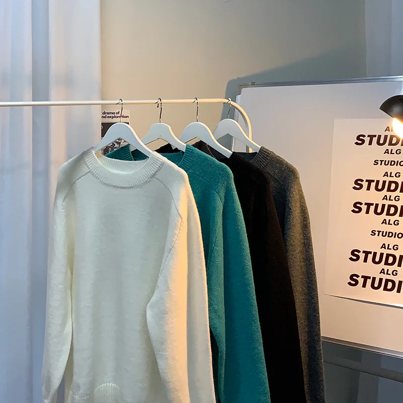 

Original film in the new port of seed male wind popular logo loose hot style men's and women's knitting sweater pure color