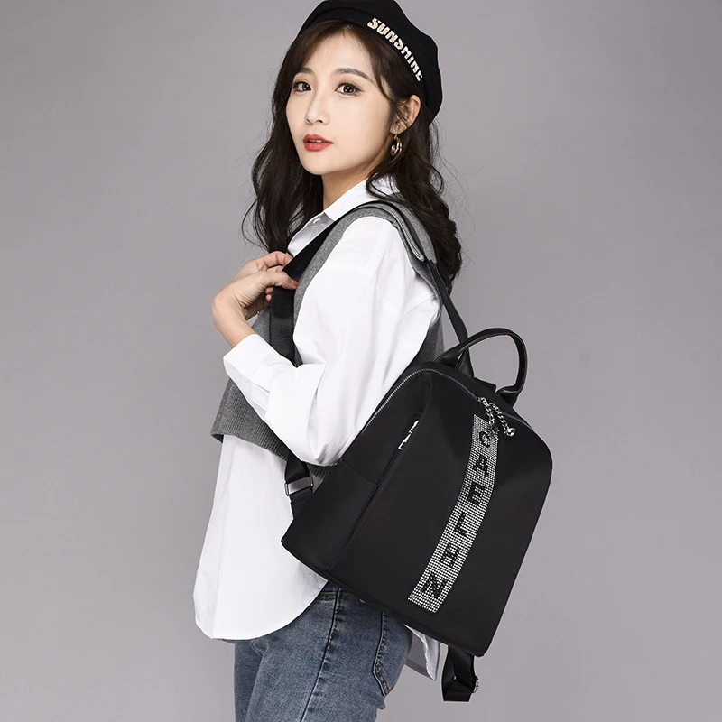 

Fashion Rivet Letter Design Women Travel Backpack High Quality Durable Oxford Backpack Pretty Style Girls School Backpack SAC
