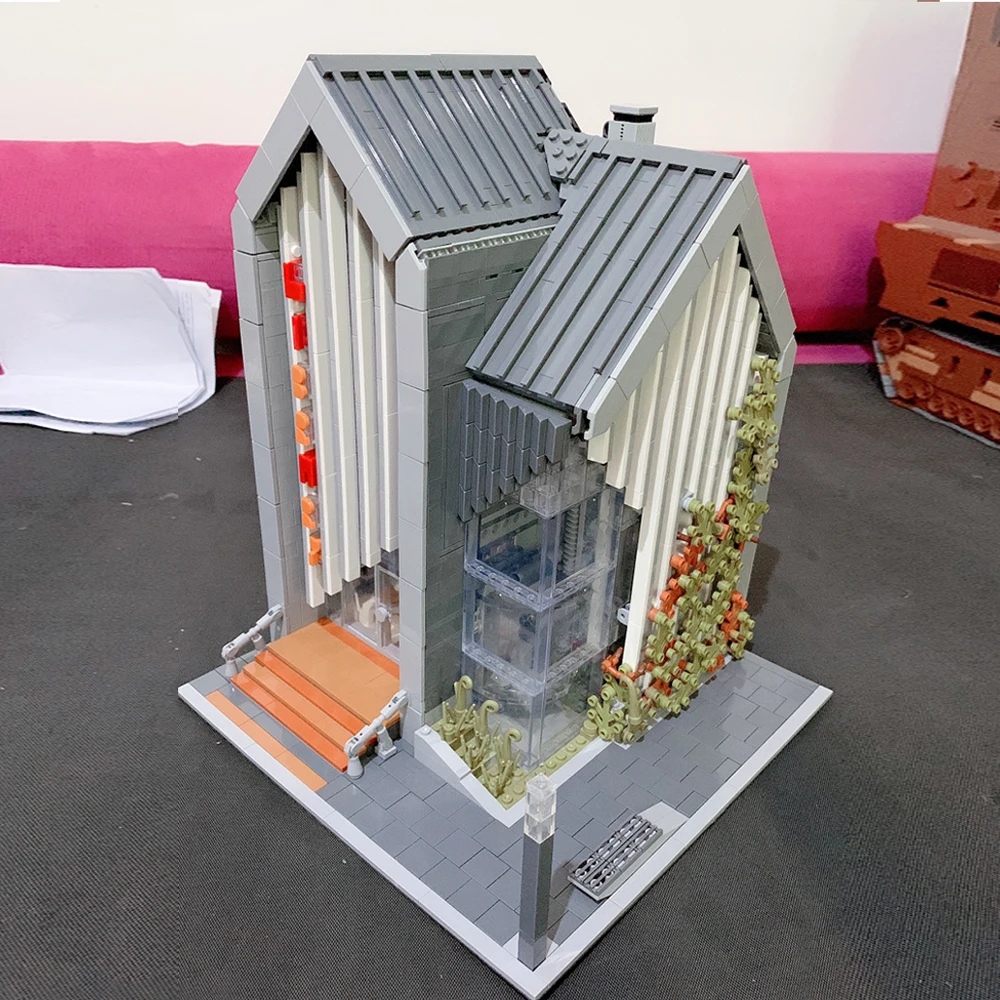 

Creative Expert Street View Modern Library Cafe Corner Model Ideas Building Blocks 2734Pcs Moc Modular Bricks Book Shop 86005