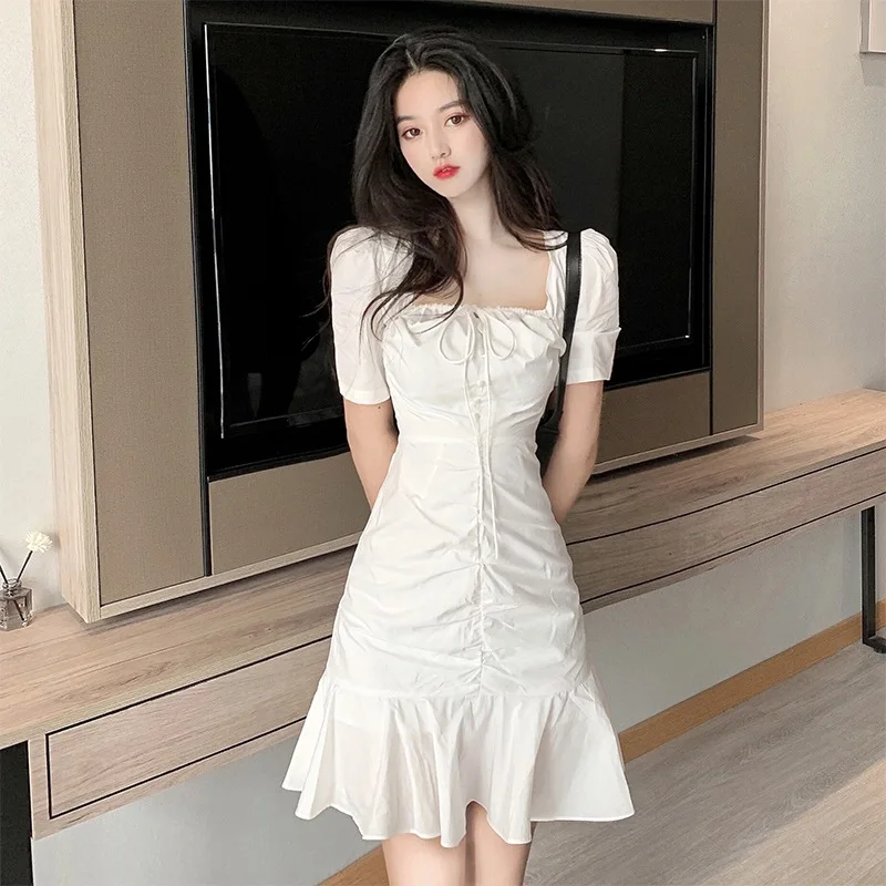 

Fashion French white dress female 2021 summer new waist slim square collar pleated ruffled fishtail skirt sweet temperament