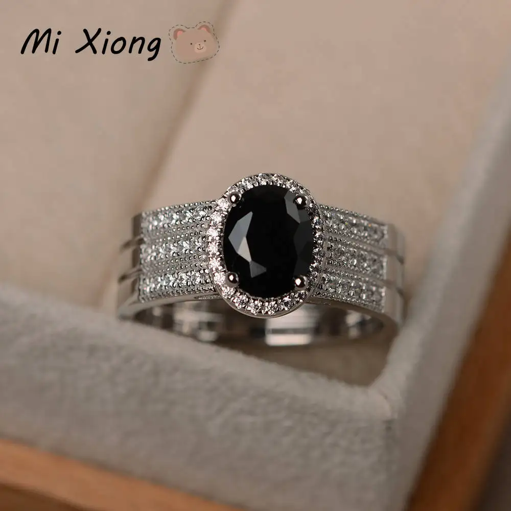 

Mi Xiong designer original new s925 sterling silver inlaid full diamond oval black crystal exquisite and elegant ladies ring