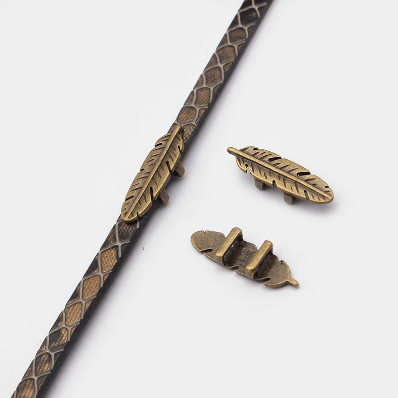 

10pcs Antique Bronze/Silver Small Feather Leaf Sliders Spacers For 5mm Flat Leather Cord DIY Bracelet Jewelry Findings Making