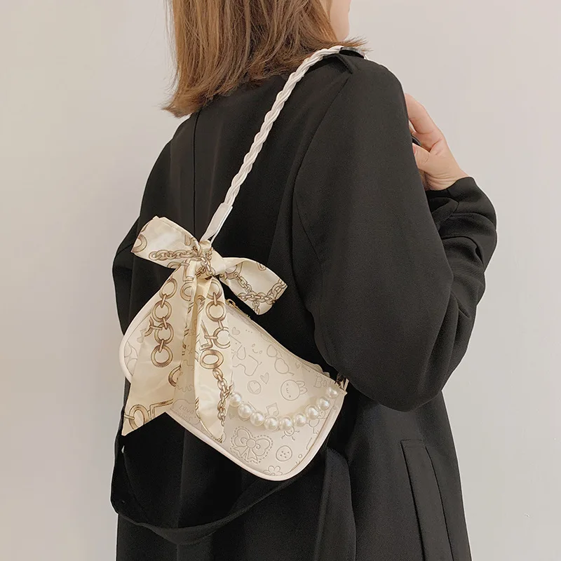 

Fresh and lovely women's armpit bag 2021 new bag women's fashion Korean pearl simple embossed single shoulder women's bag