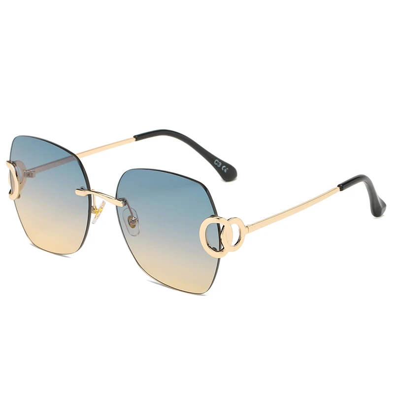

Fashion New Brand Designer Sunglasses Frameless Female Fashion Metal Frameless Lens Sunglasses Female 50567