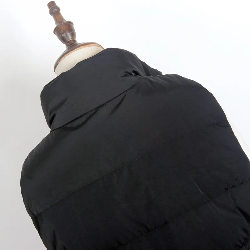 

New style down jacket vest, short stand collar, Korean version, large size, waist, thin white duck down, warm female trend