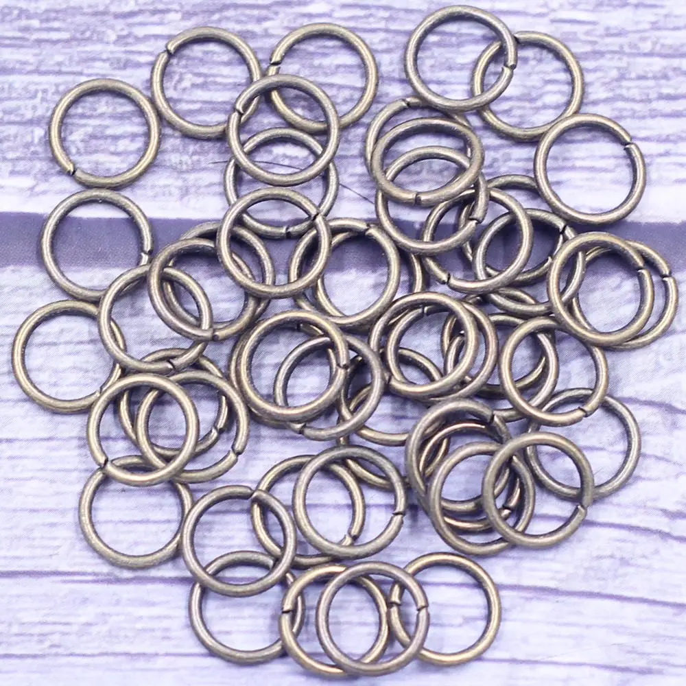 

100Pcs Open Jump Rings Round Alloy Bronze Tone Jewelry DIY Making Finding 7x1.2mm