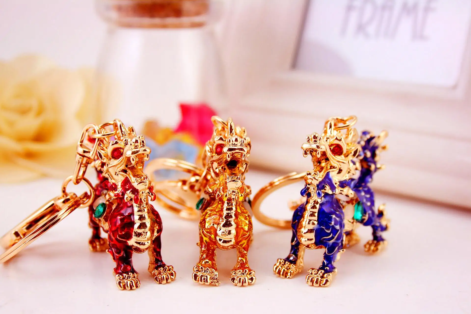 

Chinese style Key Chain creative drop oil craft small gift fire Kylin Key Chain Feng Shui metal pendant men's key ring 2020