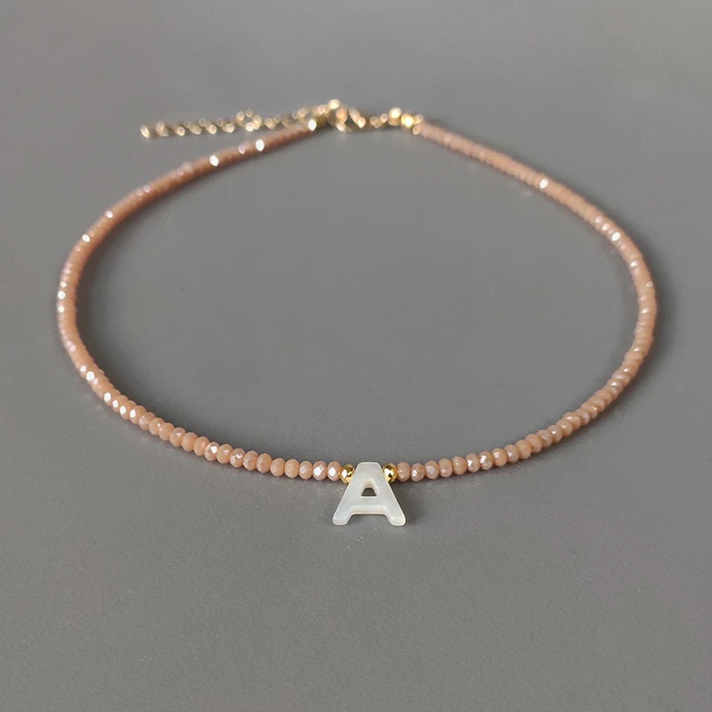 Ожерелье ручной работы с хрустальными бусинами ракушками и буквами различные